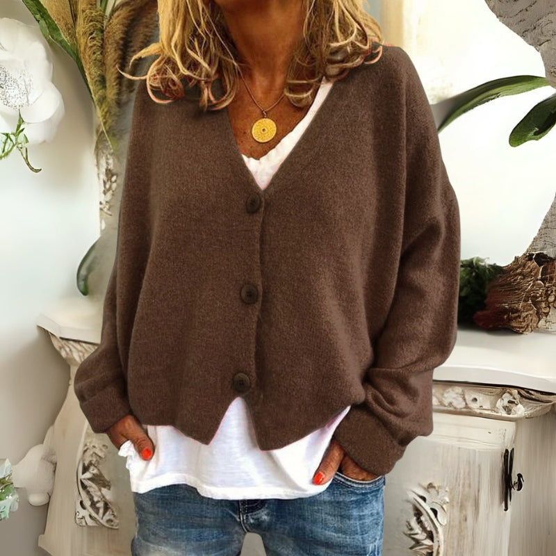 Kincső | Elvágott V-nyakú kardigán elegáns hasfedéssel