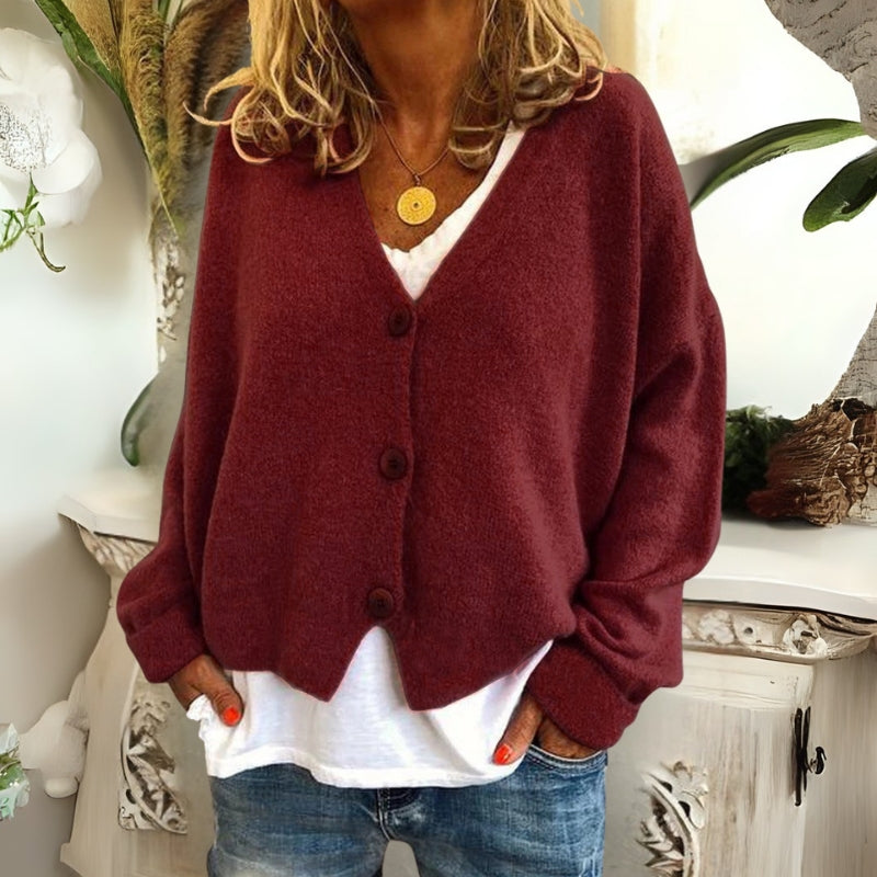 Kincső | Elvágott V-nyakú kardigán elegáns hasfedéssel